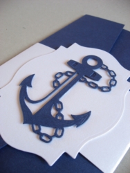 Mereteemalise pulmakutse näidis. Kasutatud sädelevaid kartonge ja pabereid.