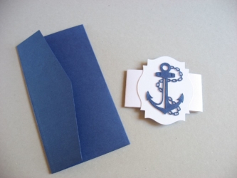 Mereteemalise pulmakutse näidis. Kasutatud sädelevaid kartonge ja pabereid.